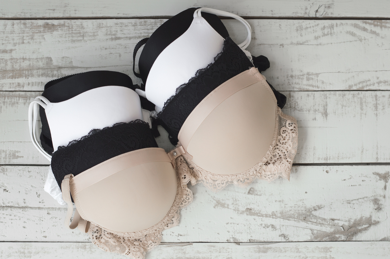 women’s bra of beige, white and black colors